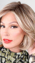 CROWD PLEASER by RAQUEL WELCH in color RL14/22SS SHADED WHEAT | Dark Blonde Evenly Blended with Platinum Blonde and Dark Roots.