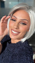 Roxie wearing AVA by JON RENAU in 60 WINTER SUN | Pure White