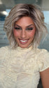 Roxie wearing BROADWAY by BELLETRESS in MILKSHAKE BLONDE R | A mixture of Light Sandy Brown, Highlighted with Light Ash Blonde with a Hint of Light Platinum Blonde with a Medium Root Color