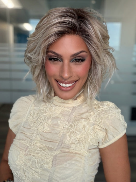 Roxie wearing BROADWAY by BELLETRESS in MILKSHAKE BLONDE R | A mixture of Light Sandy Brown, Highlighted with Light Ash Blonde with a Hint of Light Platinum Blonde with a Medium Root Color