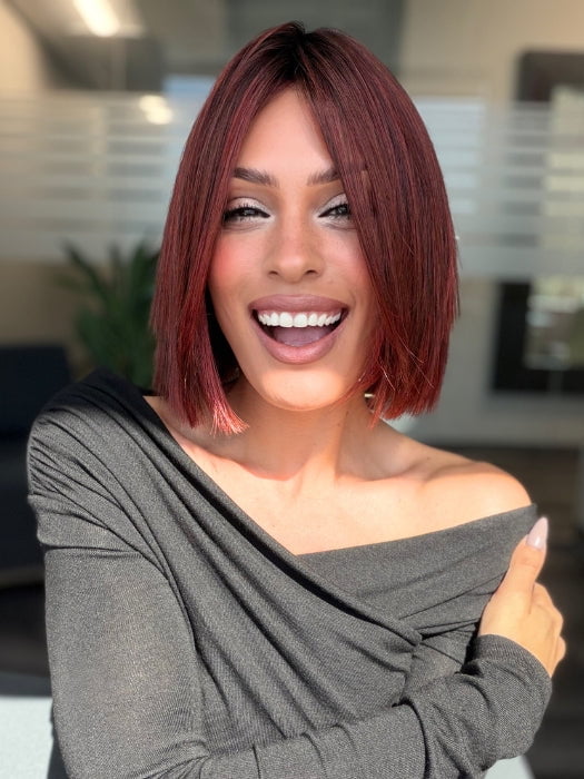 Roxie wearing CUTTING EDGE by GABOR in GF132SS SANGRIA | Intense Fiery Red with dark roots and blended highlights for dimension and depth