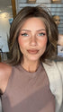 Madeline wearing FERRARI by BELLETRESS in CHOCOLATE BUTTERCREAM R | Medium and Dark Brown Rooted with a Blend of Medium Brown and Dark Blonde
