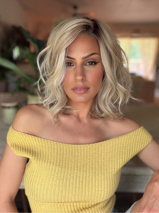Roxie wearing BRADSHAW by BELLETRESS in MILKSHAKE BLONDE R | A mixture of Light Sandy Brown, Highlighted with Light Ash Blonde with a Hint of Light Platinum Blonde with a Medium Root Color
