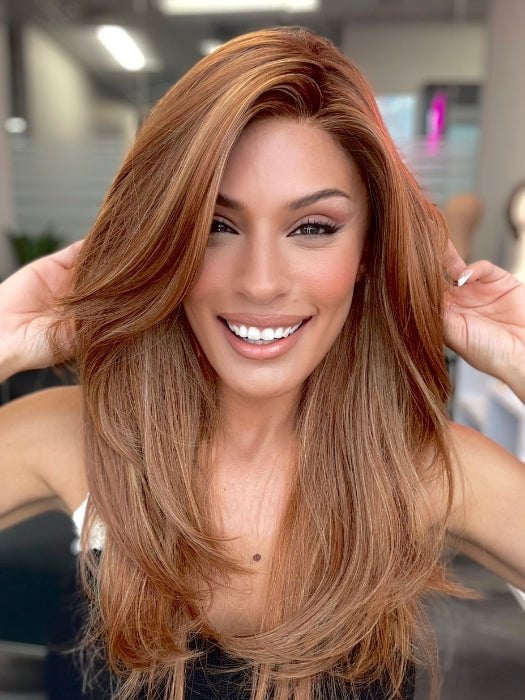 Roxie is wearing STELLA by BelleTress in color PUMPKIN PIE SPICE | A combination of Strawberry, Medium and Light Copper Red, Highlighted with Light Blond and Rooted with Medium Brown