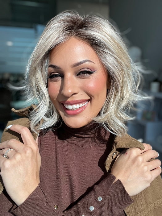 Roxie wearing NEWPORT by BELLETRESS in MILKSHAKE BLONDE R | A mixture of Light Sandy Brown, Highlighted with Light Ash Blonde with a Hint of Light Platinum Blonde with a Medium Root Color