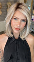 Madeline wearing PARK AVE by BELLETRESS in MILKSHAKE BLONDE R | A mixture of Light Sandy Brown, Highlighted with Light Ash Blonde with a Hint of Light Platinum Blonde with a Medium Root Color