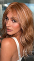 Roxie wearing FRANKY by RENE OF PARIS in CARAMEL COPPER | One‑tone Caramel Copper shade enhanced with ultra‑fine Cream Blonde highlights