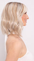 Ava wearing HOLLIE PETITE by JON RENAU in 101/88/27S8 CATALINA BLONDE | Pale blonde with Pure White Natural Violet halo highlights, shaded medium brown