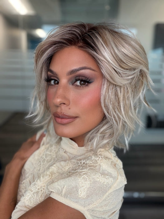 Roxie wearing BROADWAY by BELLETRESS in MILKSHAKE BLONDE R | A mixture of Light Sandy Brown, Highlighted with Light Ash Blonde with a Hint of Light Platinum Blonde with a Medium Root Color