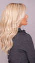 ROXIE wearing MILANO by BELLETRESS in MILKSHAKE BLONDE R | A mixture of Light Sandy Brown, Highlighted with Light Ash Blonde with a Hint of Light Platinum Blonde with a Medium Root Color