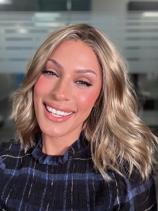 ROXIE wearing Charlotte Petite by ENVY  in SAHARA BLONDE | Softer Dark Blonde with Light Golden Blonde, and features Chestnut Roots