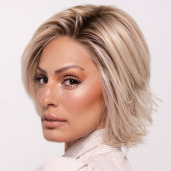 Roxie wearing ALICANTE by BELLETRESS in CRUSHED ALMOND BLONDE R | A soft Neutral Light Blonde with a Light and Medium Blended Root Color.
PPC MAIN IMAGE