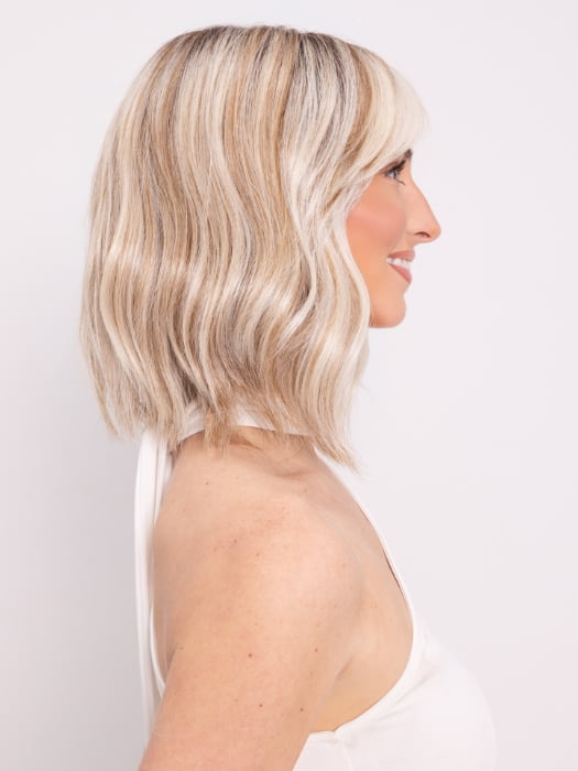 Ava wearing HOLLIE by JON RENAU in 101/88/27S8 CATALINA BLONDE | Pale blonde with Pure White Natural Violet halo highlights, shaded medium brown
