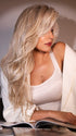 Roxie is wearing RUNWAY REHEARSAL by RAQUEL WELCH in RL19/23SS SHADED BISCUIT | Light Ash Blonde Evenly Blended with Cool Platinum Blonde with Dark Roots