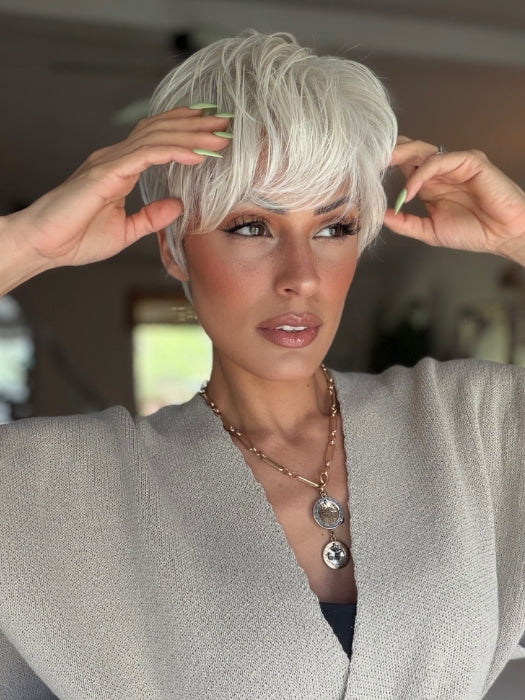 Roxie wearing CELINE by JON RENAU in 60 WINTER SUN | Pure White