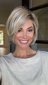 Katy C. @thewigeducator wearing IGNITE PETITE by JON RENAU in color 22F16S8 VENICE BLONDE | Light Ash Blonde and Light Natural Blonde Blend Shaded with Medium Brown