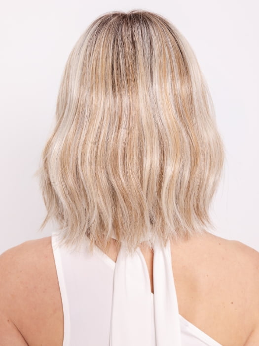 Ava wearing HOLLIE PETITE by JON RENAU in 101/88/27S8 CATALINA BLONDE | Pale blonde with Pure White Natural Violet halo highlights, shaded medium brown