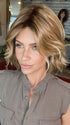 Madeline wearing AUSTEN by BELLETRESS in  CARAMEL TOFFEE BLONDE-R | Toffee is a warm, dimensional shade blending medium brown with golden blonde and caramel highlights. Softly rooted for a natural, sun-kissed finish.