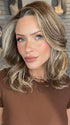 Madeline wearing ANNA by BELLETRESS in BROWN-SUGAR-COOKIE-R | The Roots are a Rich Brown Tone that seamlessly transitions into a Warm Golden Brown