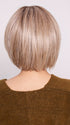 Roxie wearing BECKHAM by BELLETRESS in BUTTERCAKE BLONDE-R | A neutral-warm blonde blend featuring light brown, ash, and lightest blonde tones with natural-looking darker roots for added depth and realism.