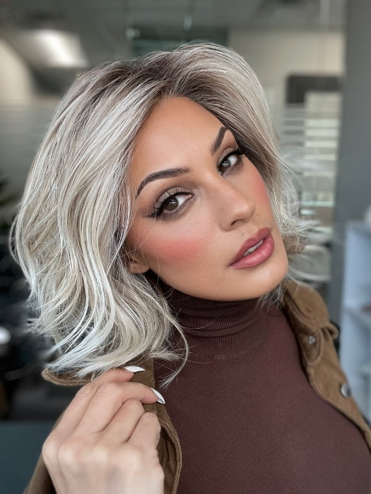 Roxie wearing NEWPORT by BELLETRESS in MILKSHAKE BLONDE R | A mixture of Light Sandy Brown, Highlighted with Light Ash Blonde with a Hint of Light Platinum Blonde with a Medium Root Color