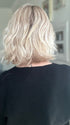 Emily H. wearing ESPRIT SMALL SOFT in PEARL BLONDE ROOTED | Pearl Platinum and Lightest Ash Blonde with Medium Ash Blonde Blend and Shaded Roots