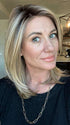 Jenny B. @thewiggygirl wearing GENOVA by BELLETRESS in color RAW SUGAR BLONDE | A Neutral Light Blonde, Honey Blonde, Pale Gold Blonde, with a base of Light Brown Low Lights featuring a Medium Root Color
