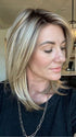 Jenny B. @thewiggygirl wearing GENOVA by BELLETRESS in color RAW SUGAR BLONDE | A Neutral Light Blonde, Honey Blonde, Pale Gold Blonde, with a base of Light Brown Low Lights featuring a Medium Root Color