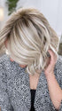 Marcie Mertz @wig.obsessed wearing NEWPORT by BELLETRESS in color CRUSHED ALMOND BLONDE R | A soft Neutral Light Blonde with a Light and Medium Blended Root Color.