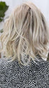 Marcie Mertz @wig.obsessed wearing NEWPORT by BELLETRESS in color CRUSHED ALMOND BLONDE R | A soft Neutral Light Blonde with a Light and Medium Blended Root Color.