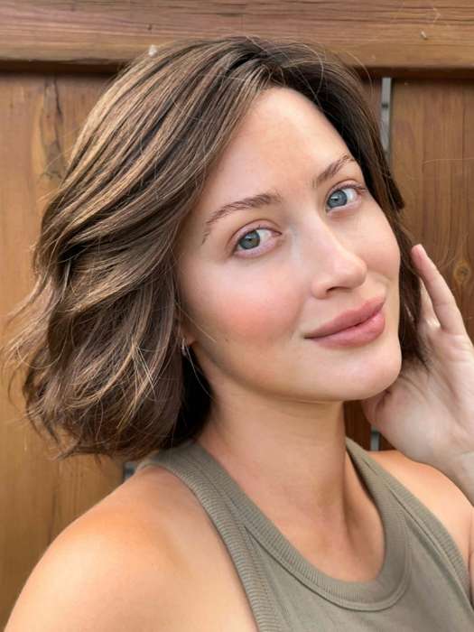 Steph @wigswithsteph wearing ESPRIT by ELLEN WILLE in color DARK-CHOCOLATE-ROOTED 6.30.4 | Dark Brown Base with Light Reddish Brown Highlights with Dark Roots Edit alt text