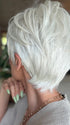 Roxie wearing CELINE by JON RENAU in 60 WINTER SUN | Pure White