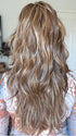 Sandy wearing GAIA by BELLETRESS in JAMOCA-ALMOND-FUDGE-R | Deep mocha brown blended with subtle golden almond undertones and fudge-like highlights to create a rich brunette hue