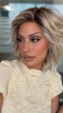 Roxie wearing BROADWAY by BELLETRESS in MILKSHAKE BLONDE R | A mixture of Light Sandy Brown, Highlighted with Light Ash Blonde with a Hint of Light Platinum Blonde with a Medium Root Color