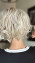 Nichole @nichole.alee wearing TREND ALERT by RAQUEL WELCH in GF19-23SS BISCUIT | Light Ash Blonde Evenly Blended with Cool Platinum Blonde with Dark Roots