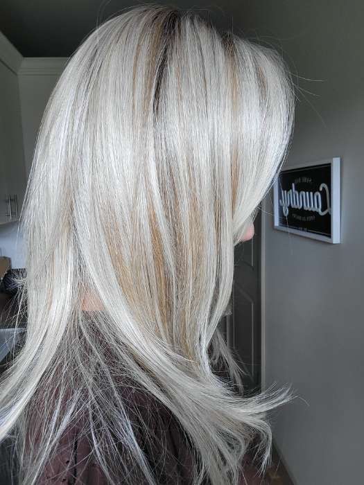 Natalie @vanish.into.thin.hair wearing LAUREN by BELLETRESS in color BURNT BISCUIT BLONDE | A Blend of Sand, Honey, and Creamy Soft Blonde with a Medium Root | inside window natural lighting