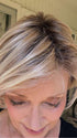 Mel B. @mels.be.ageless wearing SAN FRANCISCO by BELLETRESS in color MILKSHAKE BLONDE R | A mixture of Light Sandy Brown, Highlighted with Light Ash Blonde with a Hint of Light Platinum Blonde with a Medium Root Color
