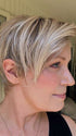 Mel B. @mels.be.ageless wearing SAN FRANCISCO by BELLETRESS in color MILKSHAKE BLONDE R | A mixture of Light Sandy Brown, Highlighted with Light Ash Blonde with a Hint of Light Platinum Blonde with a Medium Root Color

