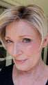 Mel B. @mels.be.ageless wearing SAN FRANCISCO by BELLETRESS in color MILKSHAKE BLONDE R | A mixture of Light Sandy Brown, Highlighted with Light Ash Blonde with a Hint of Light Platinum Blonde with a Medium Root Color
