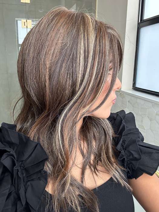 Lorena Calderon @faux.hurr.lifee wearing MILANO by BELLETRESS in color DARK BROWN HL | A Blend of Dark Brown, Strawberry Light Auburn and Soft Chunky Medium and Dark Blonde Highlights.
