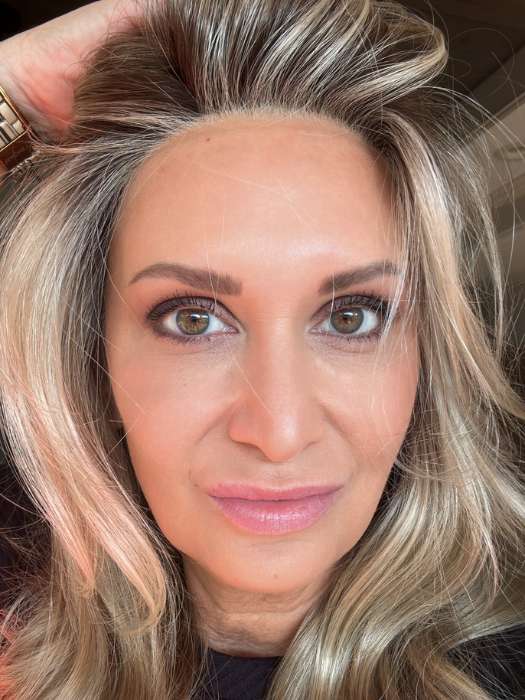 Emily H. @she_sheds_more wearing AMBER by JON RENAU in color 22F16S8 VENICE BLONDE | Light Ash Blonde and Light Natural Blonde Blend Shaded with Medium Brown
