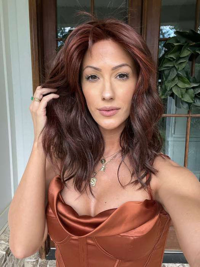 Jenna Fail @jenna_fail wearing BEACH WAVE MAGIC by TRESSALLURE in color 10/130R | Bright Red with Medium Brown roots