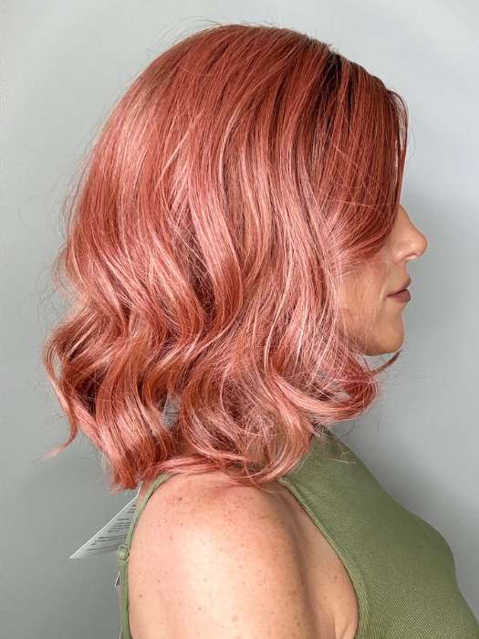 Kristyna @kristynamoore wearing PANACHE WAVEZ by RENE OF PARIS in color DUSTY-ROSE | Medium Coral Red Base with Dark Brown Roots