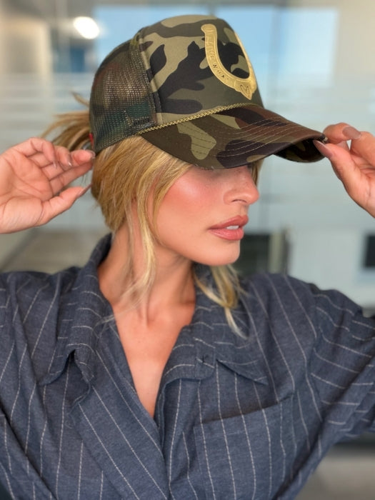 Roxie wearing POSH WAVEZ by RENE OF PARIS (Styled) in Bronzed Honey-R | A perfect blend of rich, warm golden blond and medium chocolate brown tones, complemented by a dark chocolate root that adds a luxurious, dimensional effect.