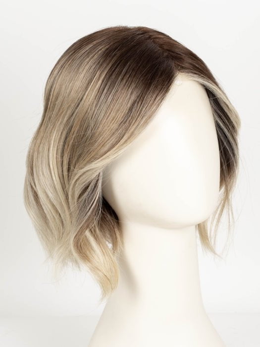 MELTED SAND | Rich, warm brown root melts into the neutral blond tone. Light-beige blond ends complete this stunning color.   