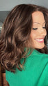 Jenna Fail @jenna_fail wearing AMANDA by ENVY in color CINNAMON RAISIN | Medium Brown with Auburn and Cinnamon highlights