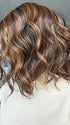 Lorena @faux.hurr.lifee wearing ANDIE by BELLE TRESS in color PEANUT BUTTER CHOCOLATE R | Velvety Chocolate Brown Roots that seamlessly transition into Warm, Golden Peanut Butter Tones, creating a luscious, sunlit effect with hints of Caramel and Honey hues woven throughout