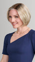 Model is wearing AVA in 22F16S8 VENICE BLONDE | Light Ash Blonde and Light Natural Blonde Blend Shaded with Medium Brown