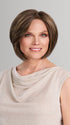 Model is wearing AVA in 8RH14 MOUSSE CAKE | Medium Brown with 33% Medium Natural Blonde Highlights