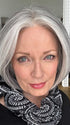 Mel B. @mels.be.ageless wearing AYUMI by RENE OF PARIS in color SILVER STONE | Silver Medium Brown blend that transitions to more Silver then Medium Brown then to Silver Bangs